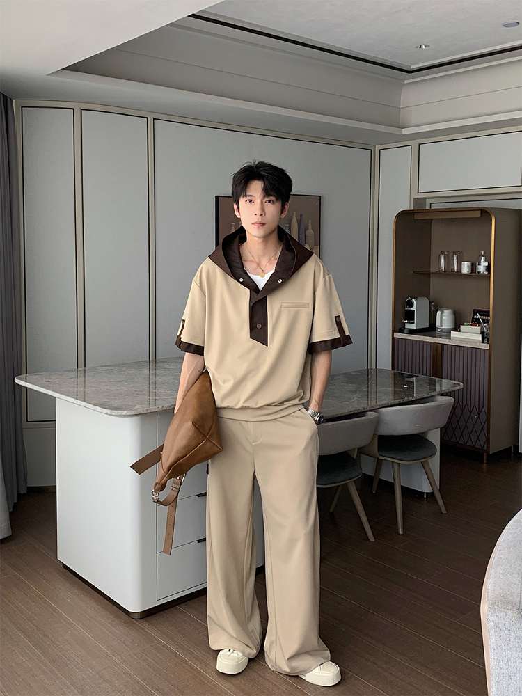 Messy fringe + oversized brown-hood collar top + beige relaxed polo tee + beige wide-leg trousers + cream slip-on sneakers