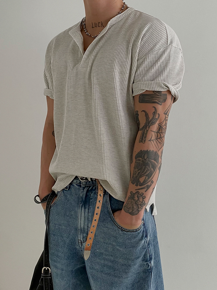 Steel Chain Necklace + Waffle-Knit Split-Neck Tee + Rivet Leather Belt + Washed Blue Relaxed Jeans + Black Tote Bag