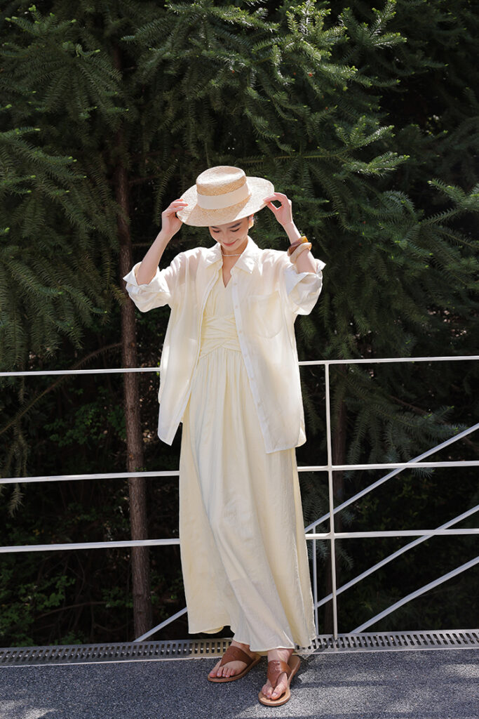 Straw boater hat + sheer ivory overshirt + lemon ruched maxi dress + tan leather slides