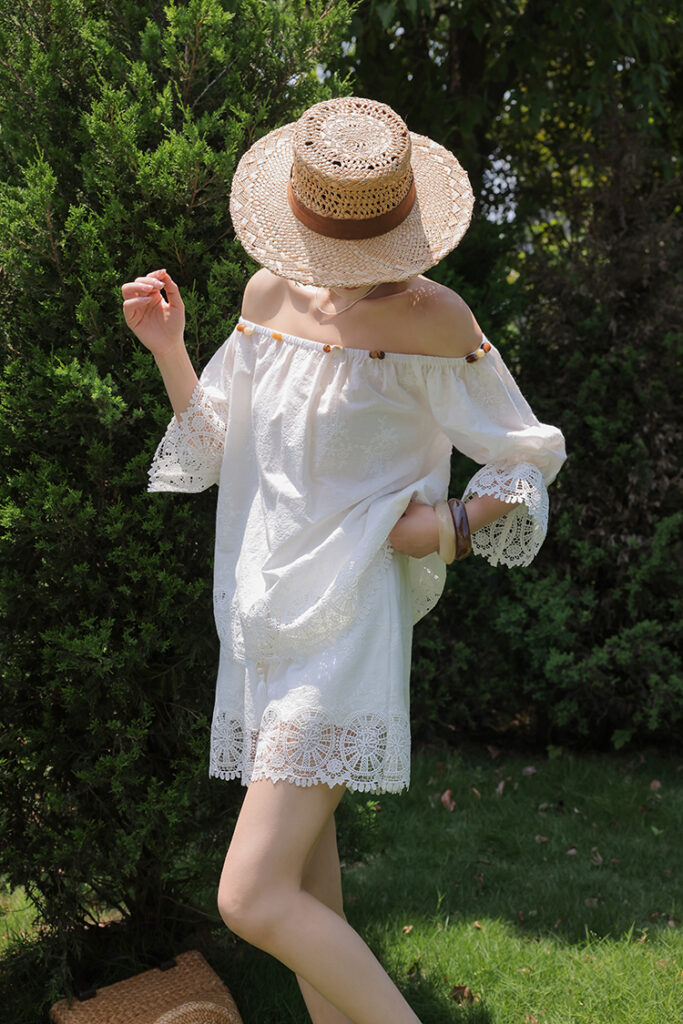 Straw boater hat + off-shoulder lace-trim mini dress