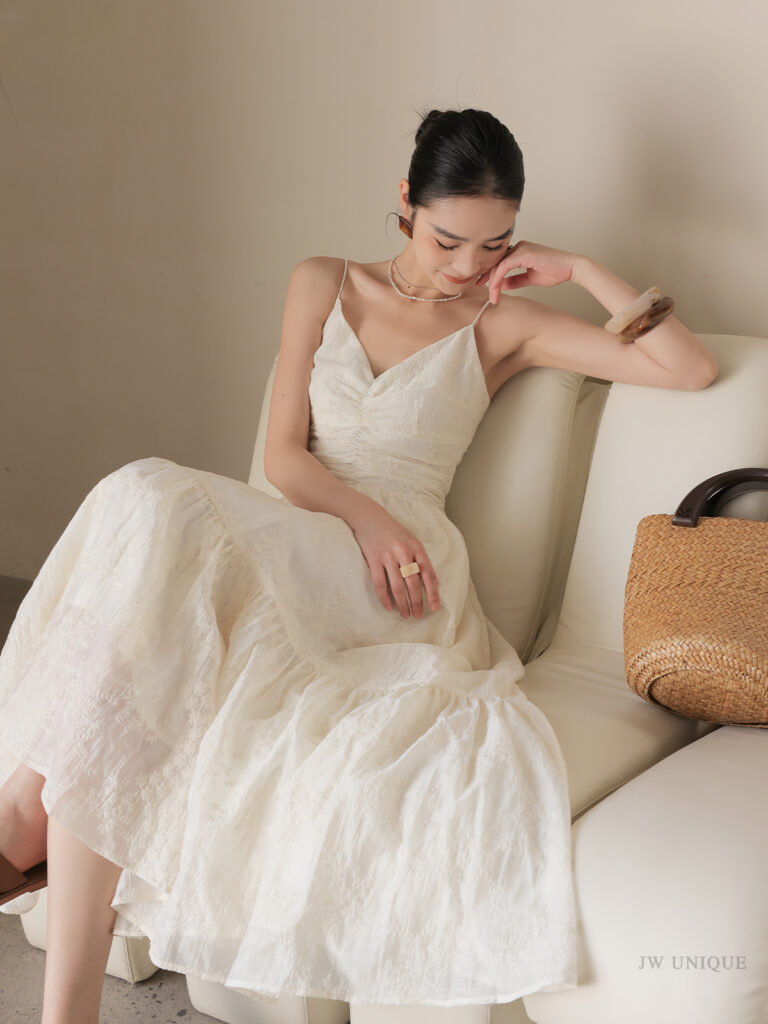 Pearl Necklace + Ivory Spaghetti-Strap Ruched Maxi Dress + Brown Slide Sandals + Woven Clutch
