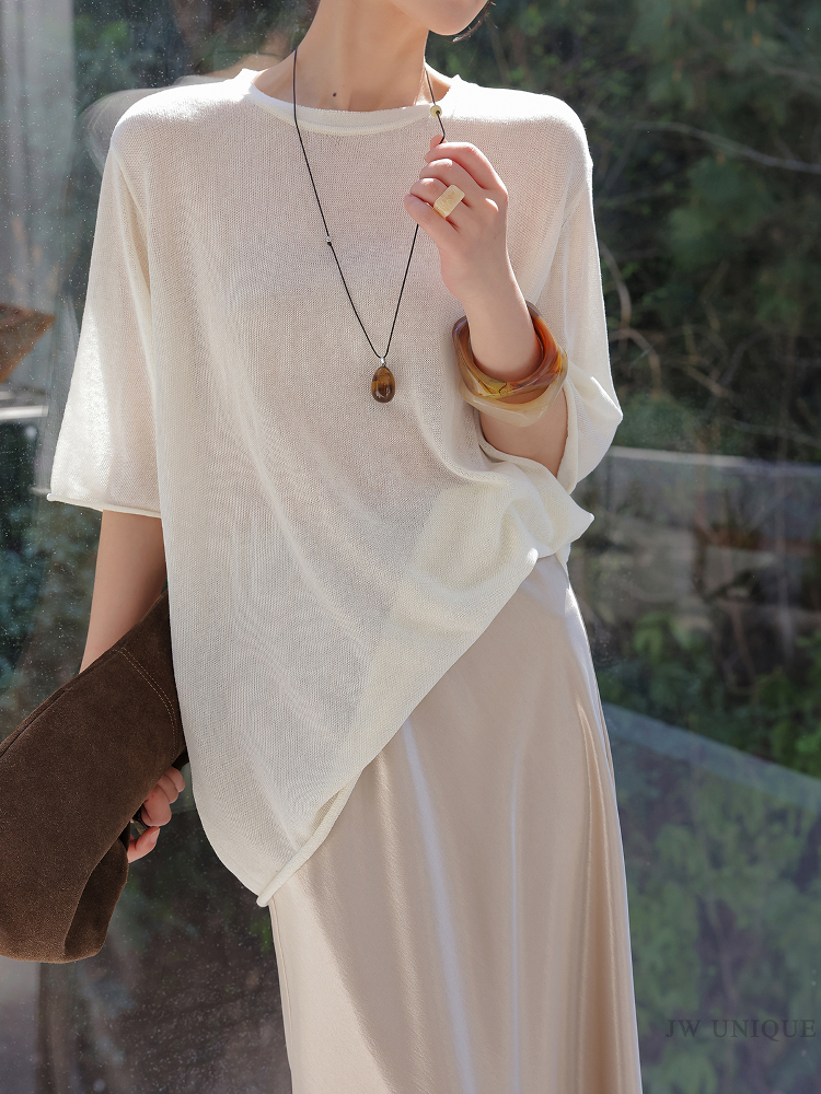 Straw boater hat + ivory ruched spaghetti-strap dress + resin bangles