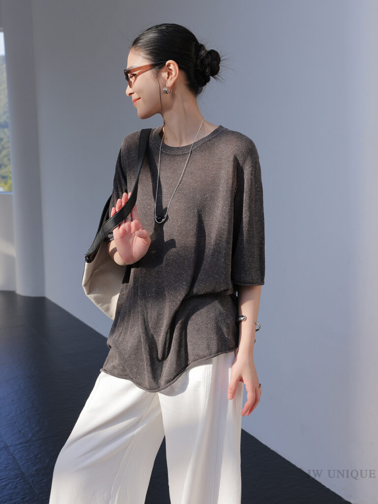 Tortoiseshell Wayfarer Sunglasses + Charcoal Sheer Oversized Tee + Long Pendant Necklace + White Wide-Leg Trousers + Canvas Shoulder Tote