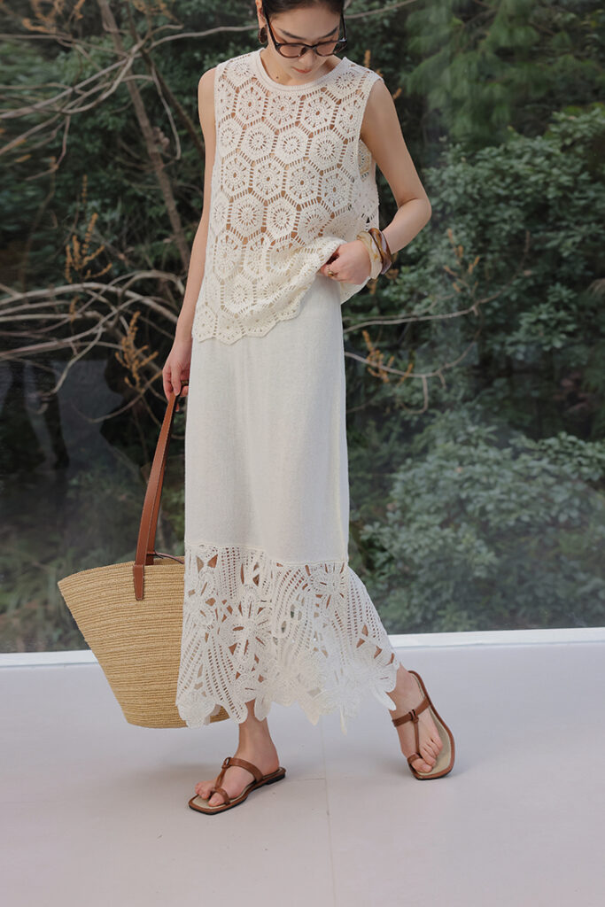 Ivory gauze poncho tee + champagne satin slip skirt + suede clutch