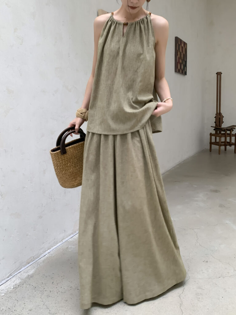 Slick knot + beaded cuff + olive drawstring halter tank + olive wide-leg palazzo pants + basket bag