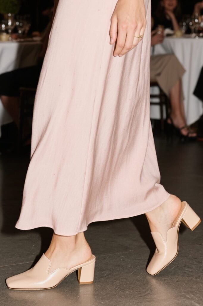 👠 5. Heeled Mules or Wedges – The Elevation You Need
